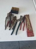 Five piece open end wrench set, channel locks, pliers, vice grip, hex keys.