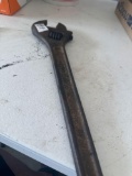 Large crescent wrench.