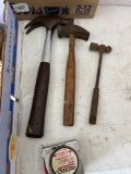 Claw hammer, tin snips, tin shears, filter wrench, ball peen, hammer, tape measure, pipe wrench,