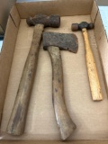 Two ball peen hammers, and hatchet.