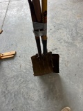 Potato fork and two flat sand shovels.
