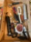 Box of assorted screw drivers, grease guns, sanding pads,