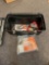 Tool box of tools, hammer, crescent wrench, pliers, ratchet strap