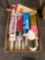 Box of assorted caulk and glue