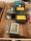Box of assorted handyman parts, door knob, flood light, Ryobi pad sander