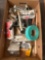 Box of assorted painting and taping supplies