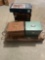 Leather bag, vintage ammunition box, magazine rack on wheels