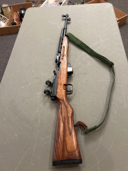 SKS 7.62 Chinesesemi automatic rifle, mounted scope rings, sling All firearms must be picked up at