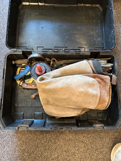 Case of farrier tools, hoof oil, clippers, chaps, rasps, curry comb