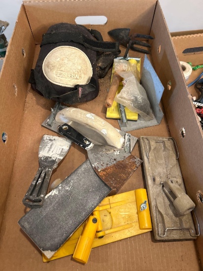 Box of assorted dry wall mudding and taping supplies, knee pads, scrapers, sanders