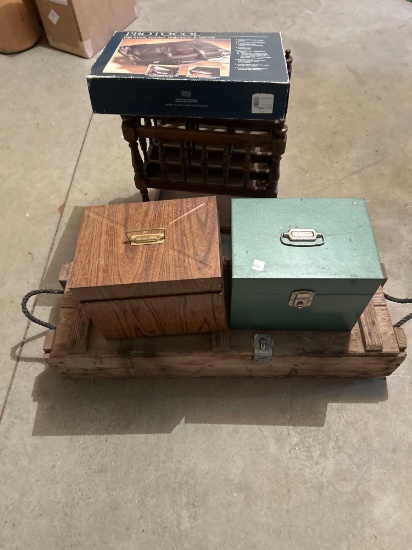Leather bag, vintage ammunition box, magazine rack on wheels