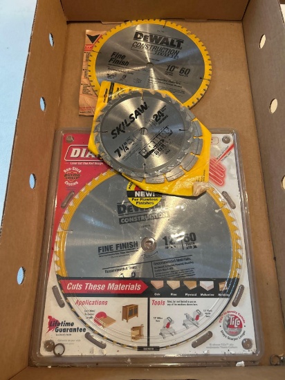 Box of assorted brand new saw blades, various sizes