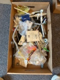 Box of assorted plumbing supplies, shower fittings and drains, stainless flex pipe etc