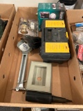 Box of assorted handyman parts, door knob, flood light, Ryobi pad sander