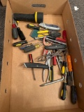 Box of assorted screw drivers, pliers, utility knives, flashlight