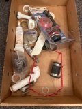 Box of assorted plumbing supplies
