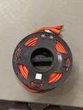 Approximately 100ft extension cord with reel
