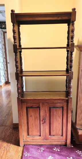 wooden bookcase with doors