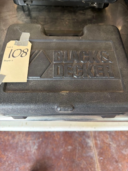 Black and Decker electric drill with bit accessories. Shipping