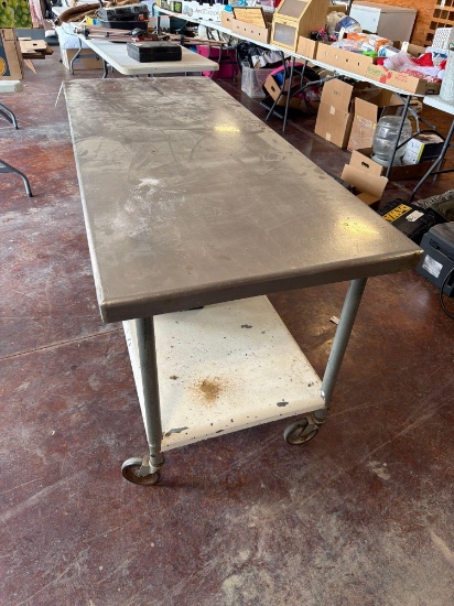 72'' Stainless steel top table on casters.