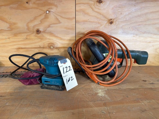 Black and Decker electric hedge trimmer, Makita palm sander,