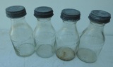 Four Generic Oil Bottles
