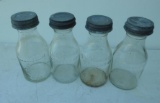 Four Generic Oil Bottles