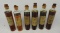 Group of Six Fleetwing Oil Sample Jars