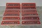 Group of 12 Bridgestone Tire Stand Signs