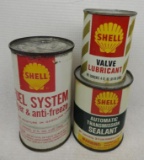 Group of Shell Additive Product Cans