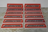 Group of 12 Bridgestone Tire Stand Signs