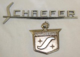 2 Schaefer Motor Car Co Emblem Badges