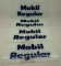 Group of Four Mobil Regular Gas Pump Ad Glass