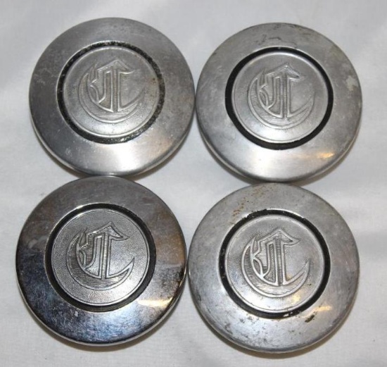 Group of 4 Chrysler Motor Car Co Threaded Hubcaps