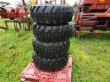 (New) 12-16.5 Tires on Bobcat Wheels (set)
