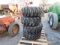 (New) 12-16.5 Tires on Bobcat Wheels (set)