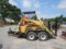 Mustang 440 Skidloader w/ Kubota Dsl & Trailer