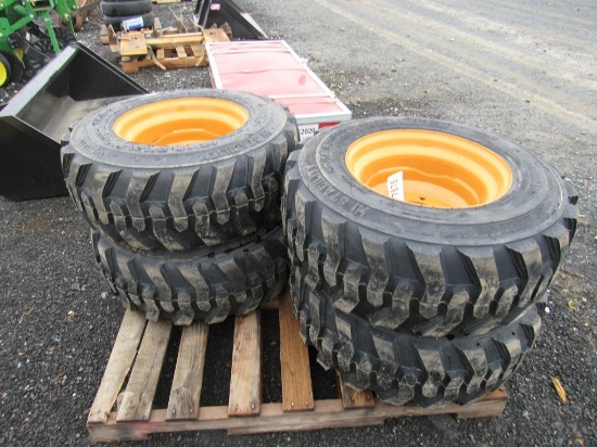 (New) 12-16.5 Tires on Wheels for Case (set 4)