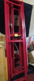Red wooden upright racks