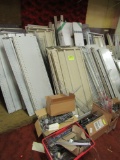 Pile of shelving, pegboard & accessories