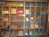 30 shelves of shelving brackets and hardware