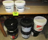 Lot of 8 buckets of linoleum adhesive