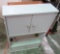 Lot of 2 bathroom cabinets & a chair