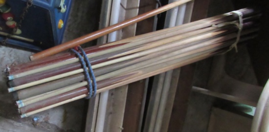 Pile of pool cues & Pool equip