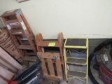 lot of 2 step stools and a step ladder