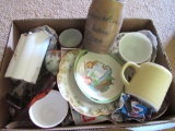 box of glassware and a Schmucker New Ulm mug