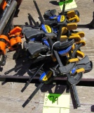 pile of bar clamps