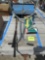seed spreader, sprinkler, golf clubs