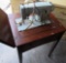 sewing machine in cabinet