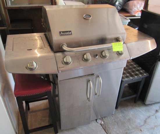 Aussie gas grill, small table and bar stool